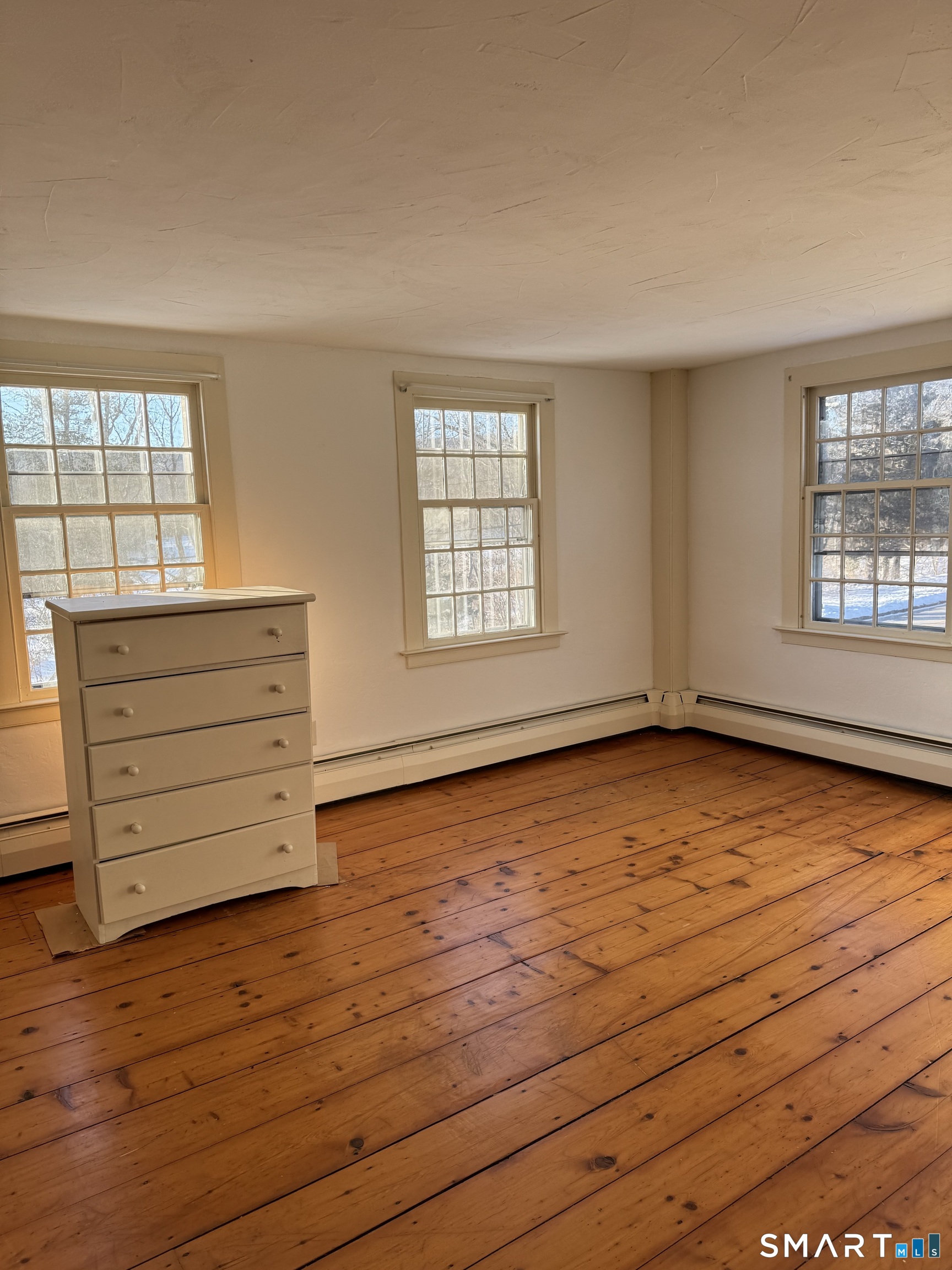 30 Hopyard Road East Haddam, CT 06423 - Photo 4 of 42 wooden floor in an empty room with a window