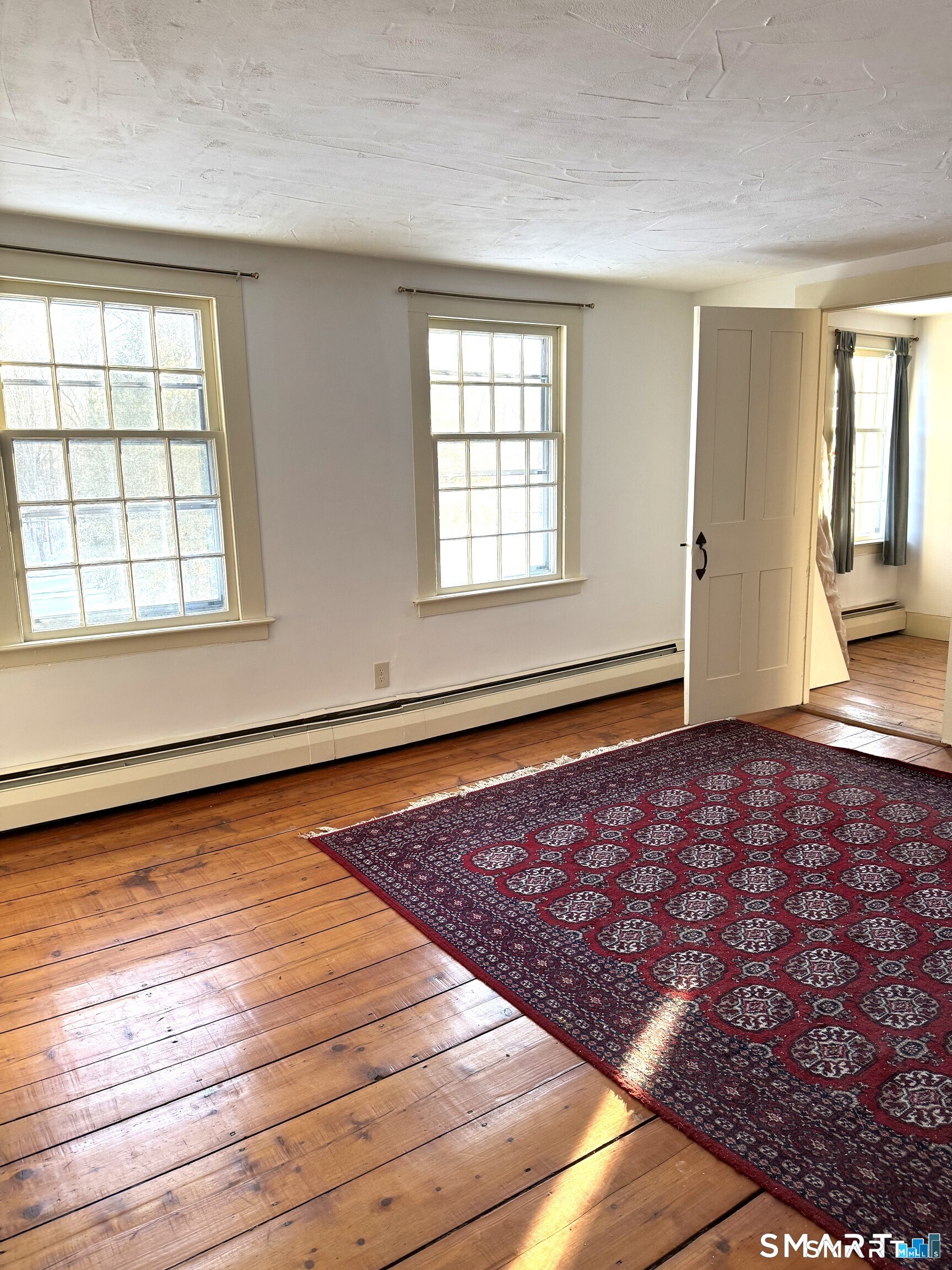 30 Hopyard Road East Haddam, CT 06423 - Photo 41 of 42 a view of an empty room with wooden floor and a window
