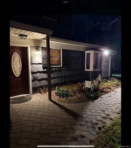 a bathroom with a large mirror