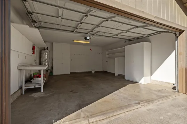 a porch with a table and chairs
