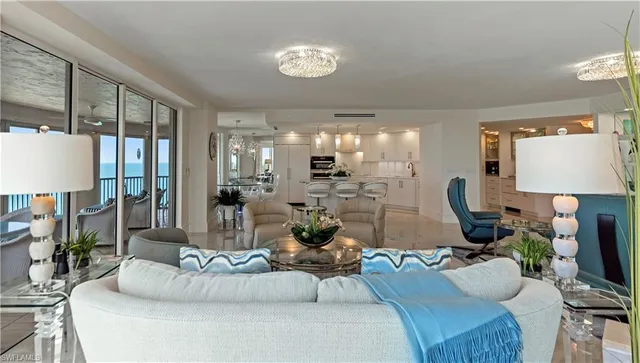 a room with furniture and a chandelier