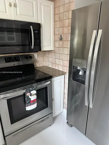 a view of stairs and an empty room