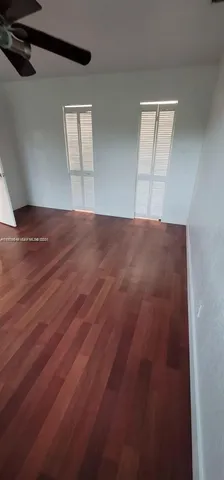 a bathroom with a sink a mirror and vanity