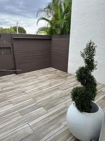 a vase of flowers sitting on a table
