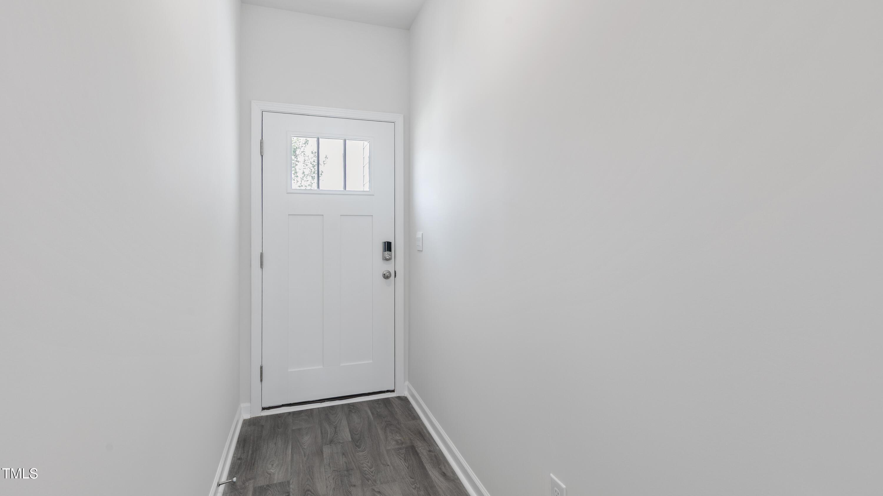 39 Virgo Drive Angier, NC 27501 - Photo 2 of 31 a view of a small space with wooden floor and a window