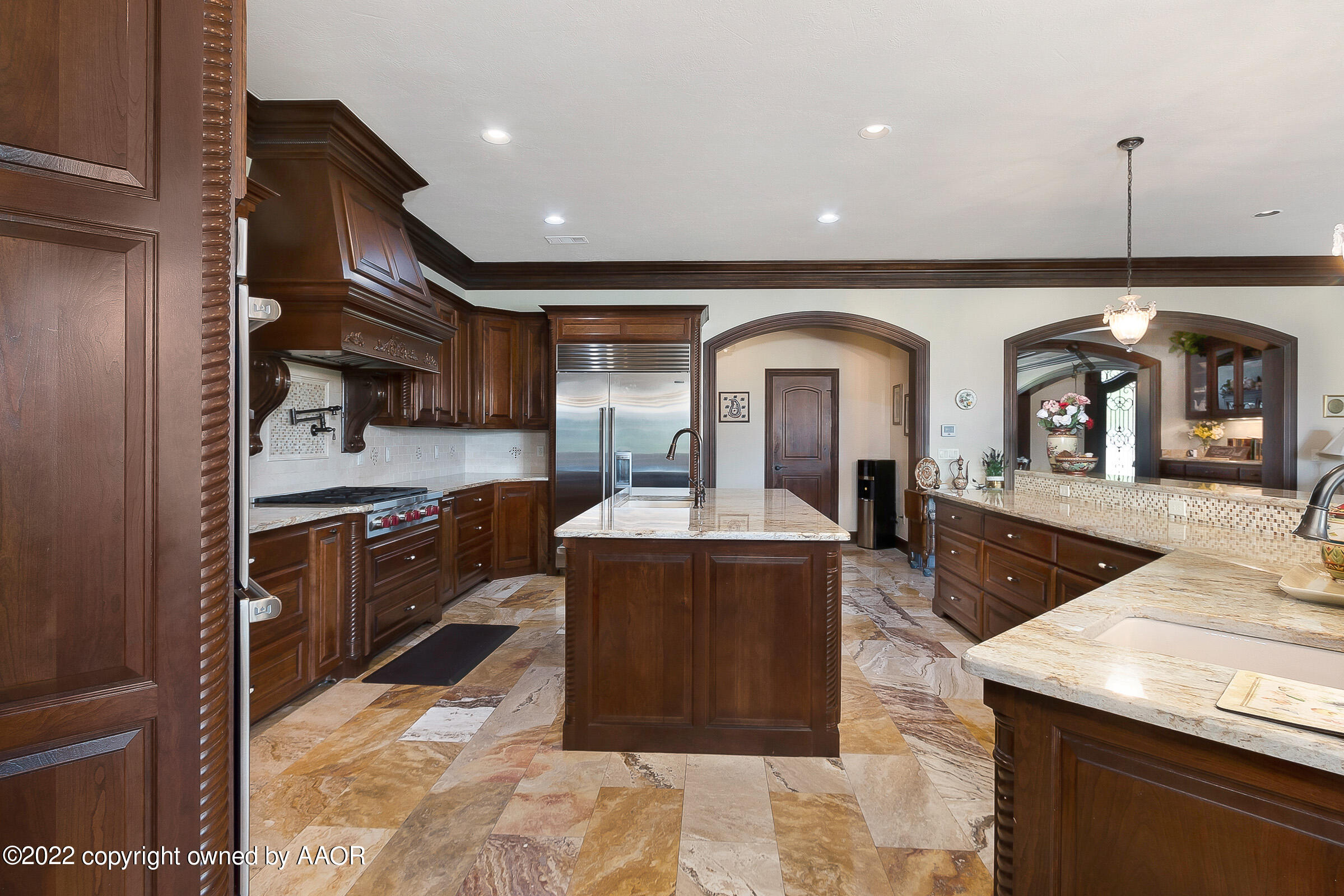 16 Merion Place Amarillo, TX 79124 - Photo 16 of 71 a kitchen with stainless steel appliances granite countertop a stove a sink and a refrigerator