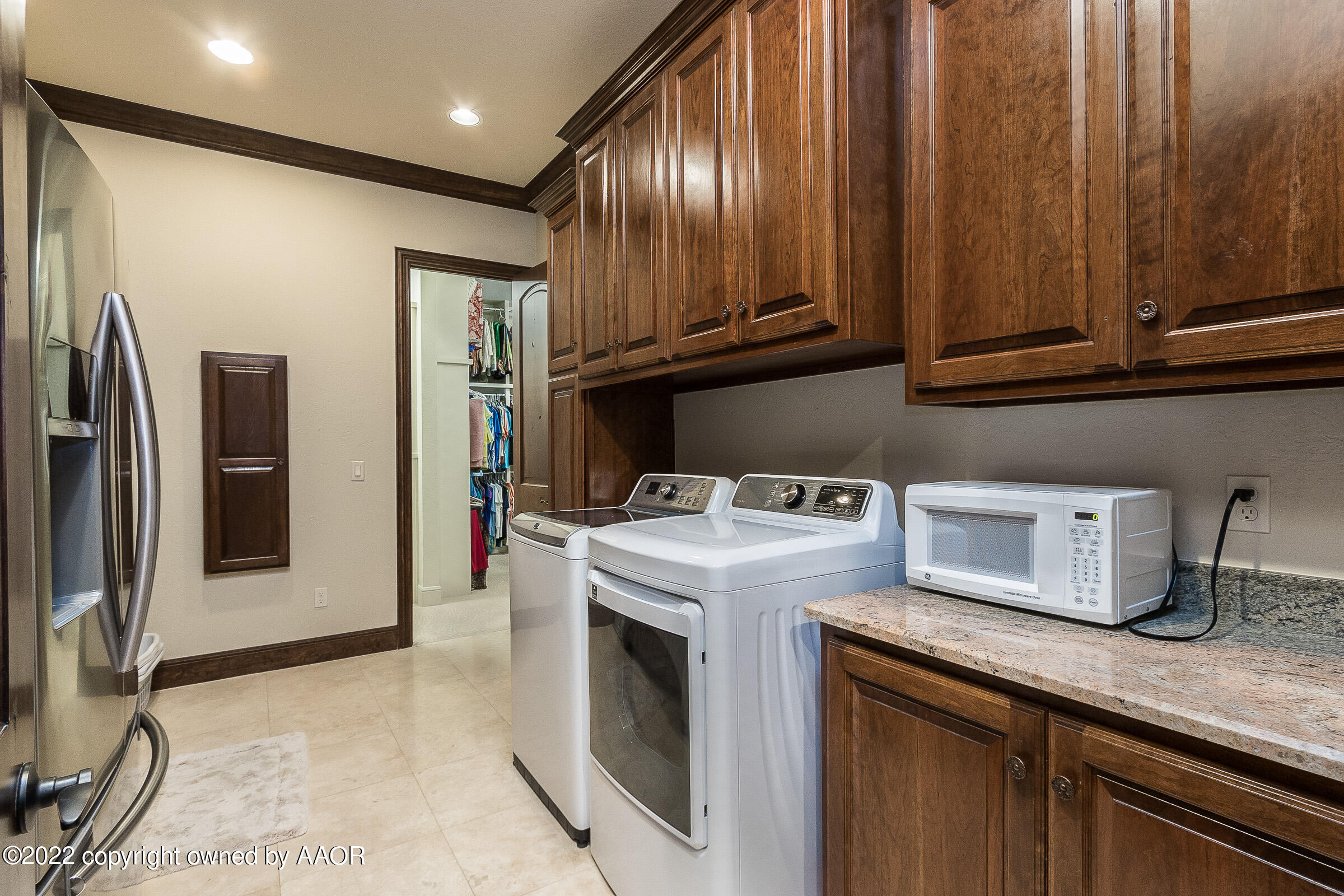 16 Merion Place Amarillo, TX 79124 - Photo 32 of 71 a kitchen with a refrigerator sink and cabinets