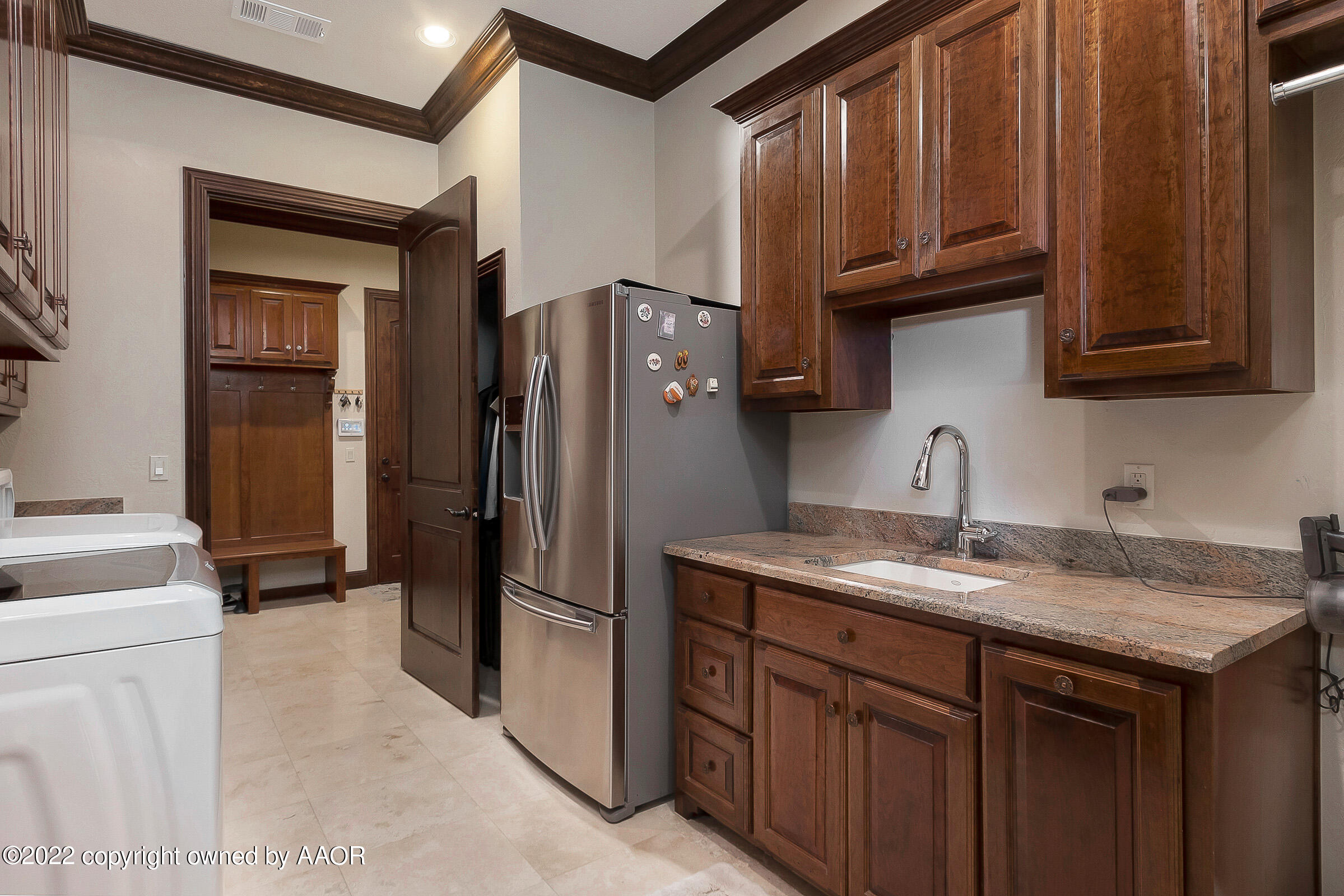 16 Merion Place Amarillo, TX 79124 - Photo 33 of 71 a kitchen with stainless steel appliances granite countertop a refrigerator and a sink