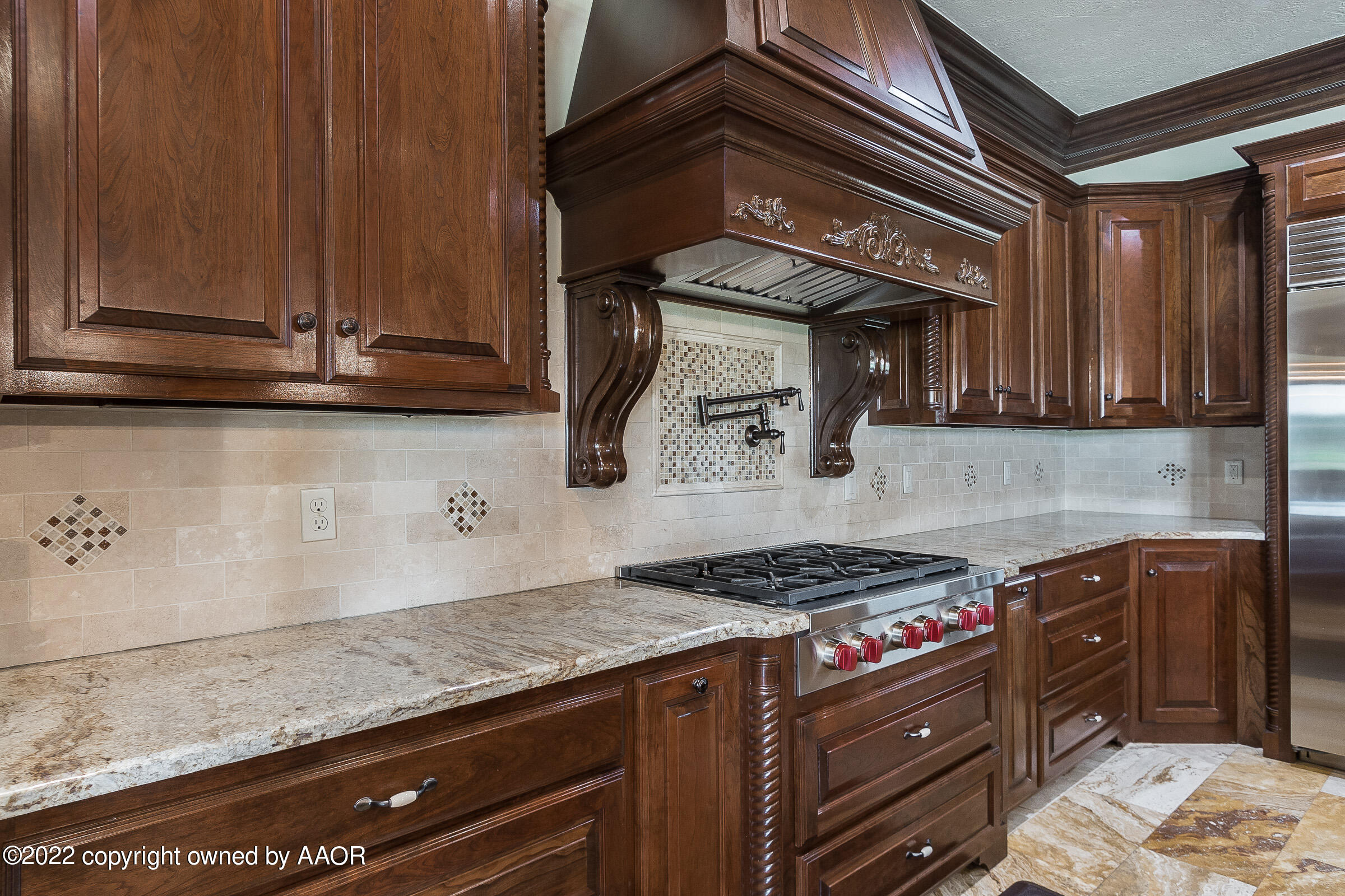 16 Merion Place Amarillo, TX 79124 - Photo 36 of 71 a kitchen with granite countertop a stove and cabinets