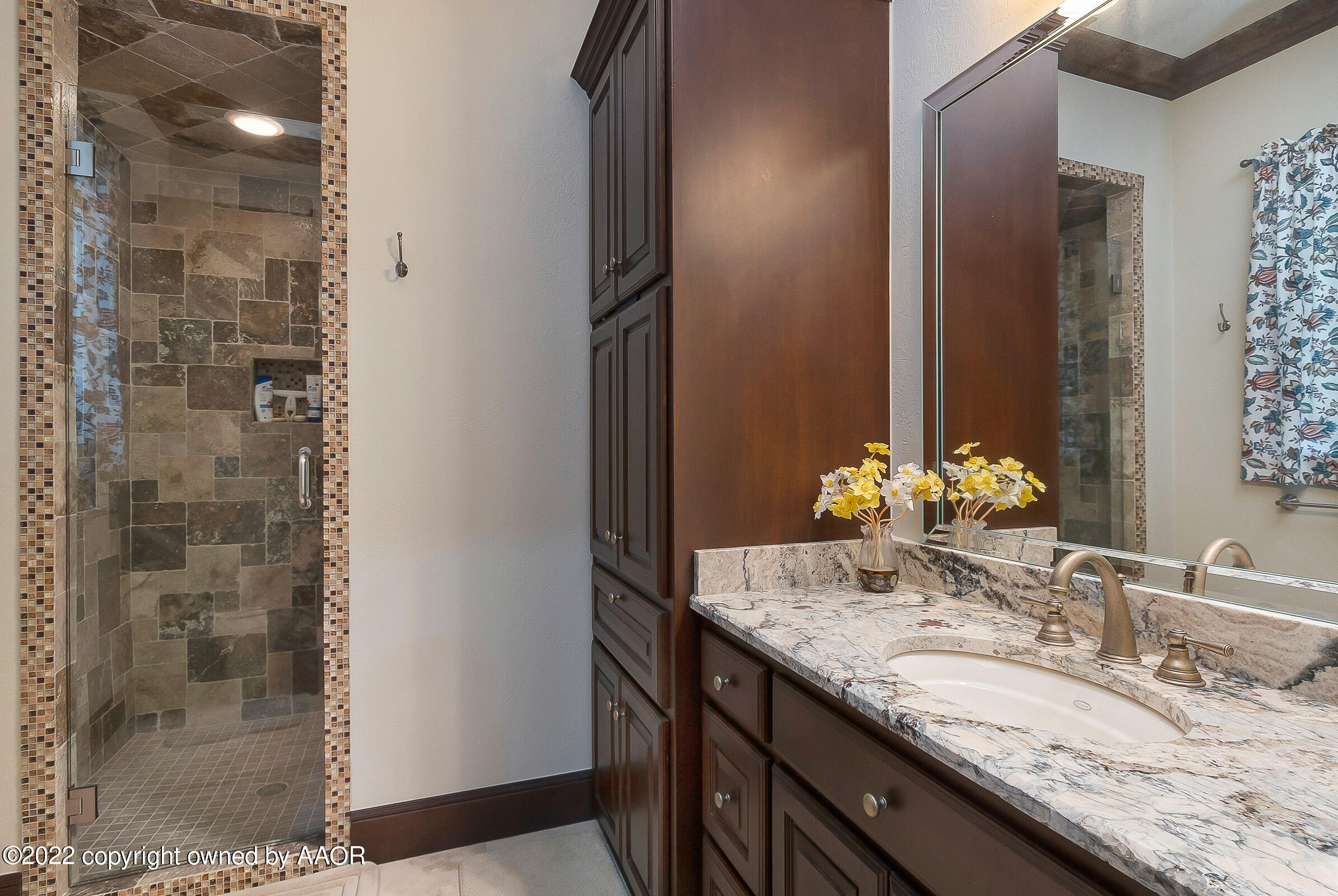 16 Merion Place Amarillo, TX 79124 - Photo 49 of 71 a bathroom with a granite countertop sink and a mirror