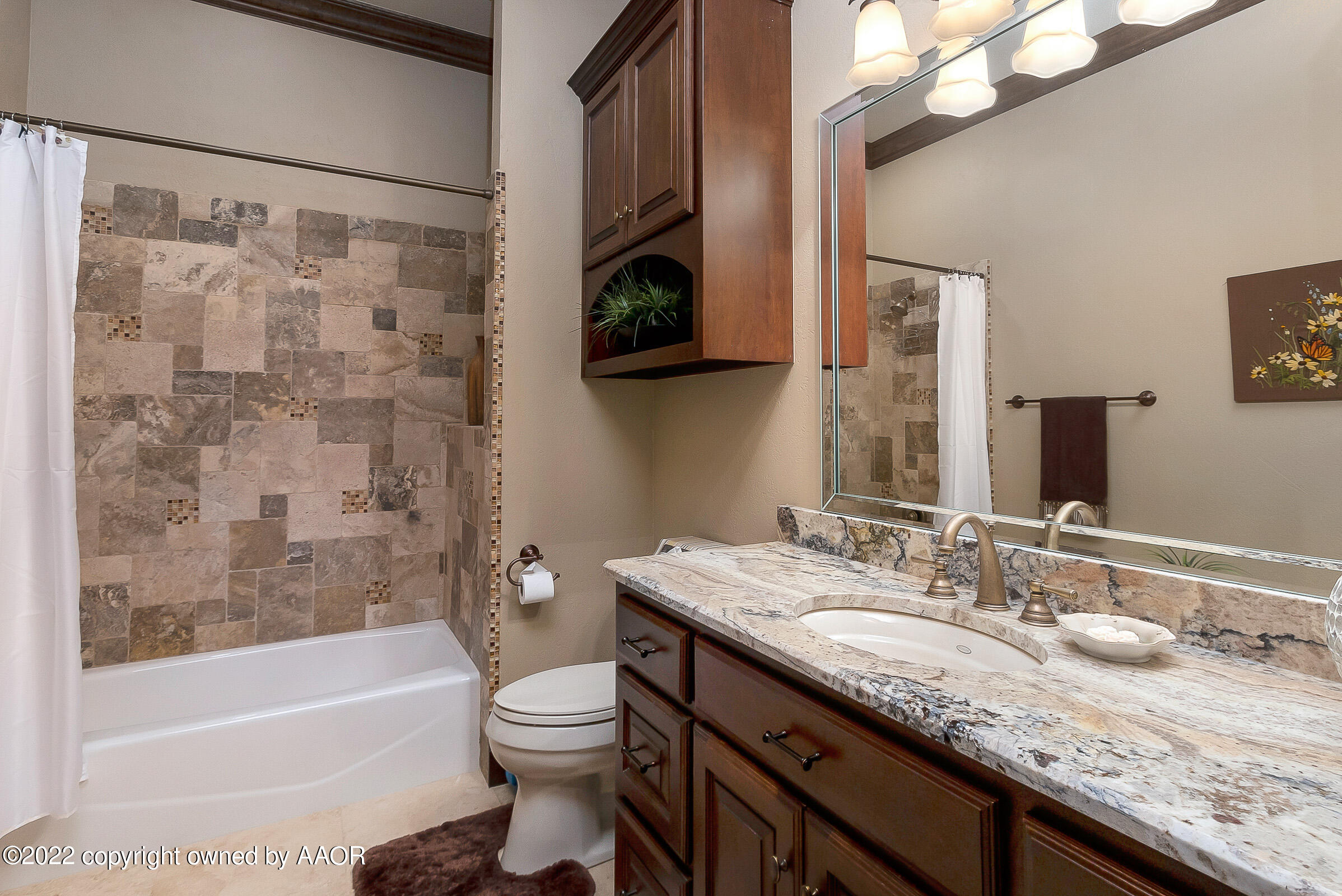 16 Merion Place Amarillo, TX 79124 - Photo 50 of 71 a bathroom with a granite countertop sink a toilet and bathtub