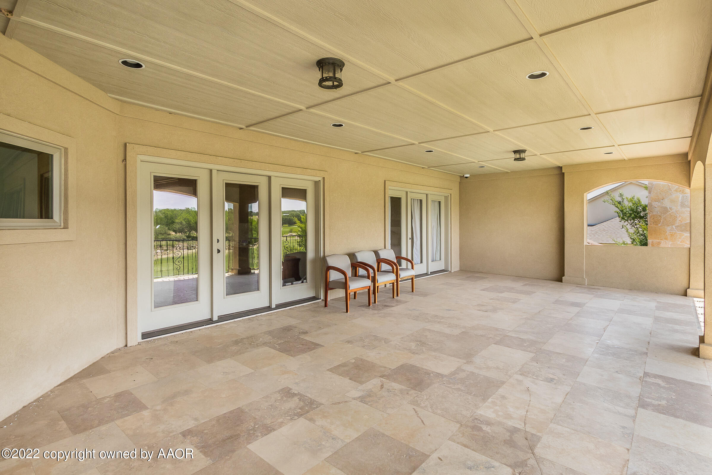 16 Merion Place Amarillo, TX 79124 - Photo 58 of 71 a view of a hall with dining area and chandelier