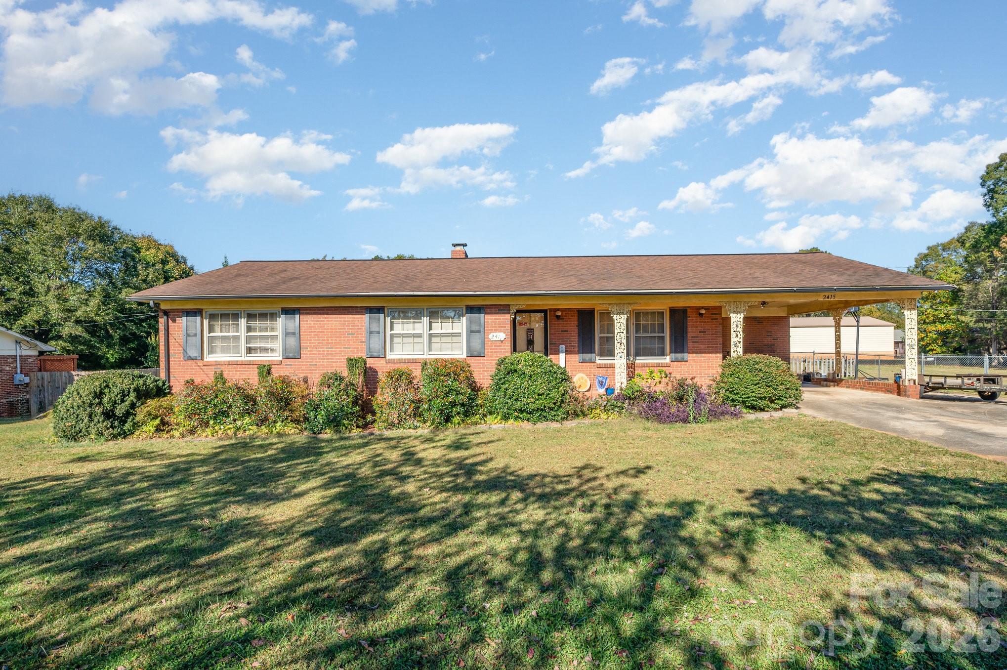 a view of a house with a big yard