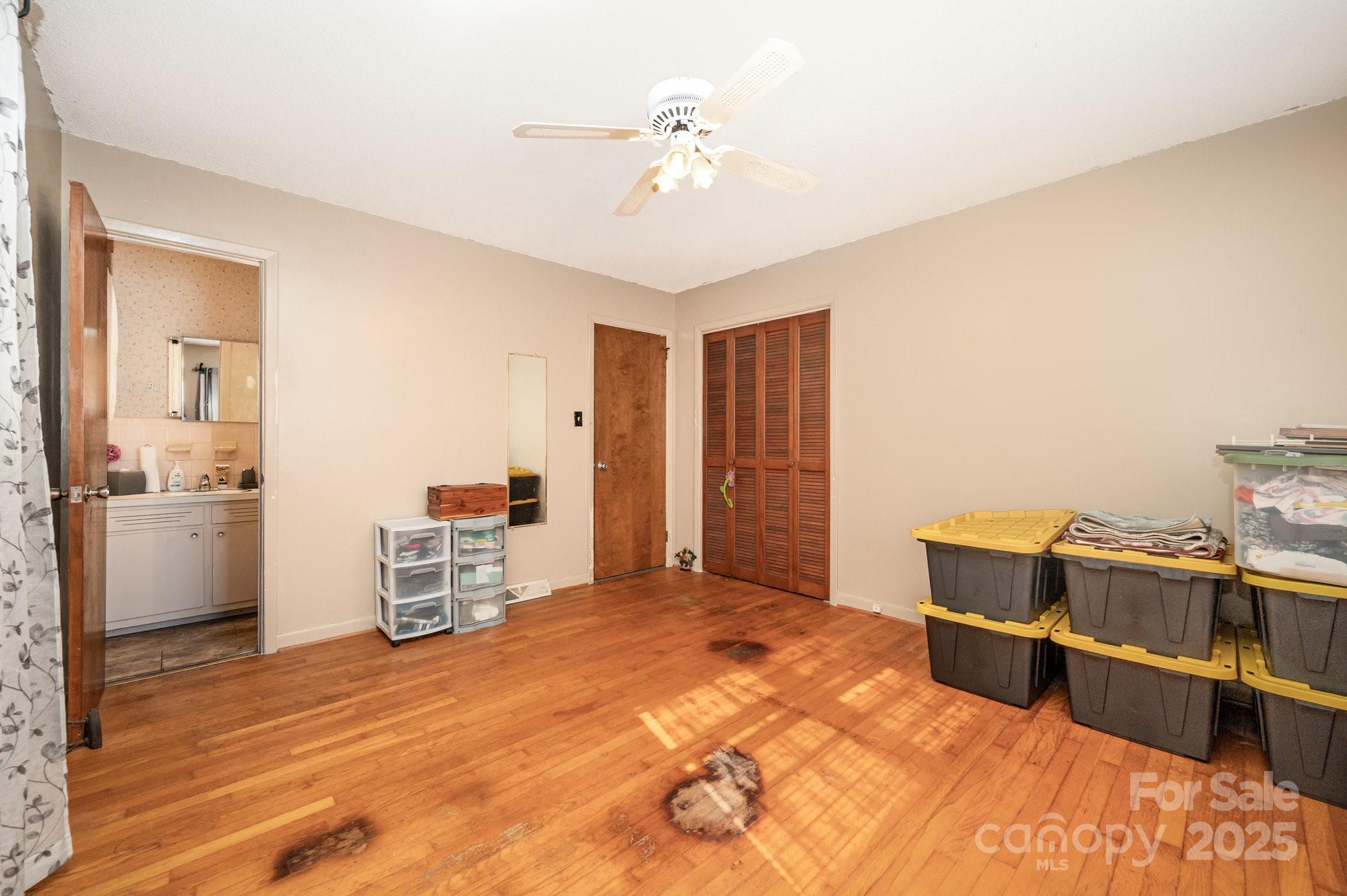 2415 Heavner Road Lincolnton, NC 28092 - Photo 12 of 21 a bedroom with furniture and window
