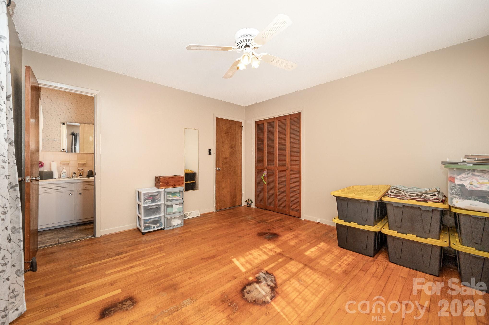 2415 Heavner Road Lincolnton, NC 28092 - Photo 12 of 21 a bedroom with furniture and window