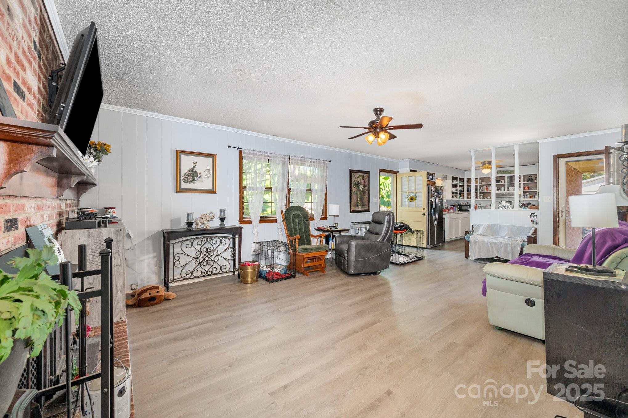 2415 Heavner Road Lincolnton, NC 28092 - Photo 7 of 21 a living room with furniture and a flat screen tv