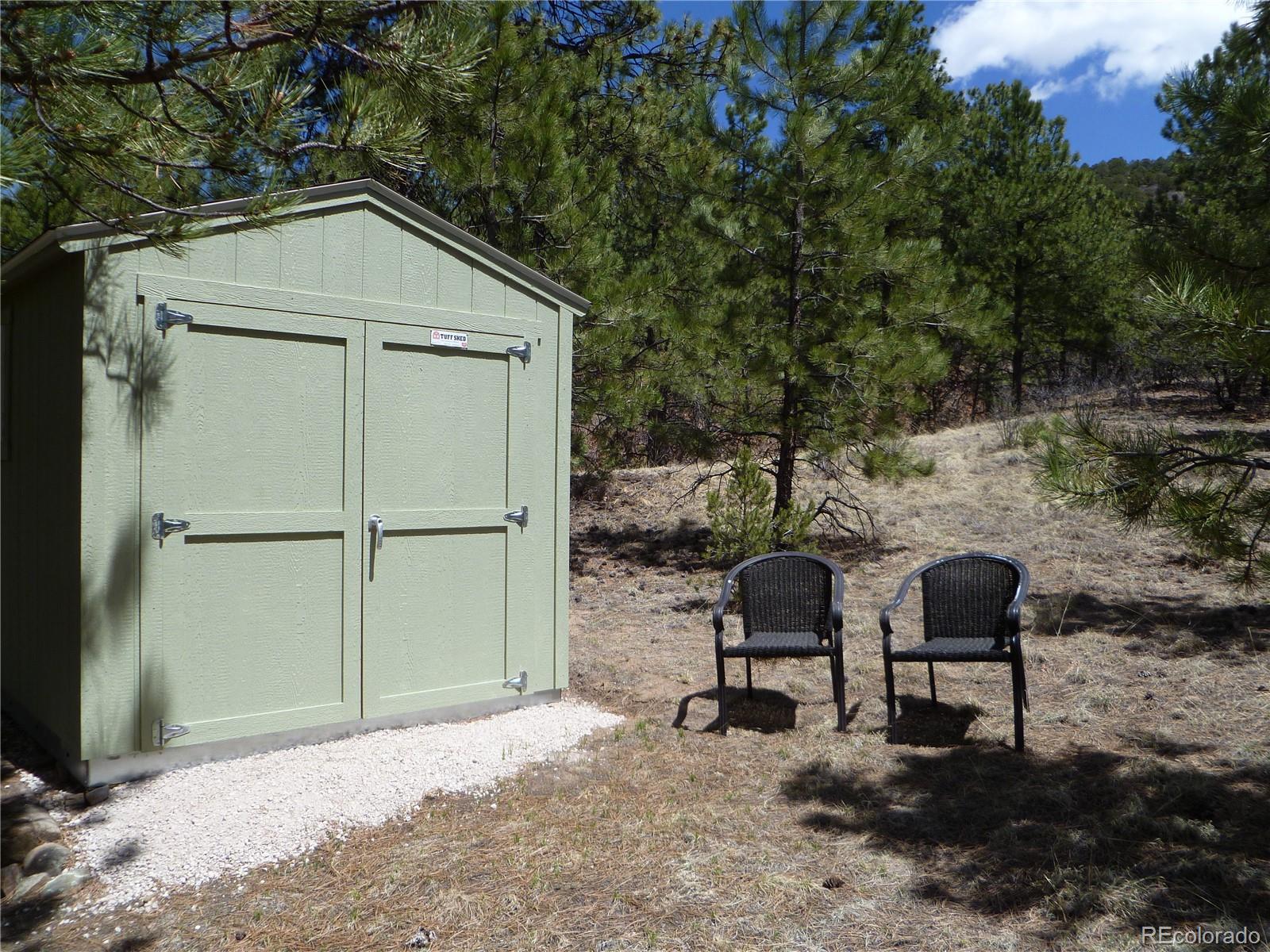 Vista View Road Canon City, CO 81212 - Photo 3 of 25 a backyard of a house with table and chairs