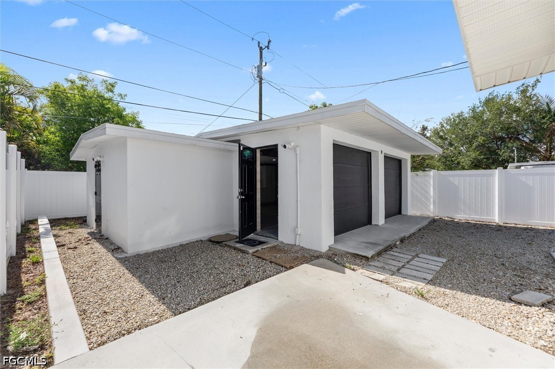 1200 Patterson Road Cape Coral, FL 33909 - Photo 30 of 42 a backyard of a house