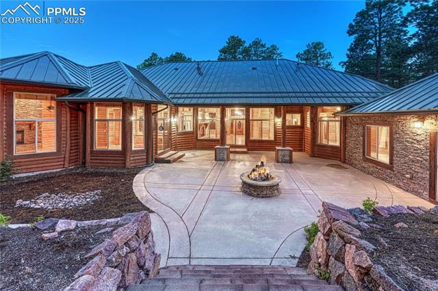 15975 Winding Trail Road Colorado Springs, CO 80908 - Photo 38 of 50 Enjoy quiet evenings by the fire in the forest while looking at the stars