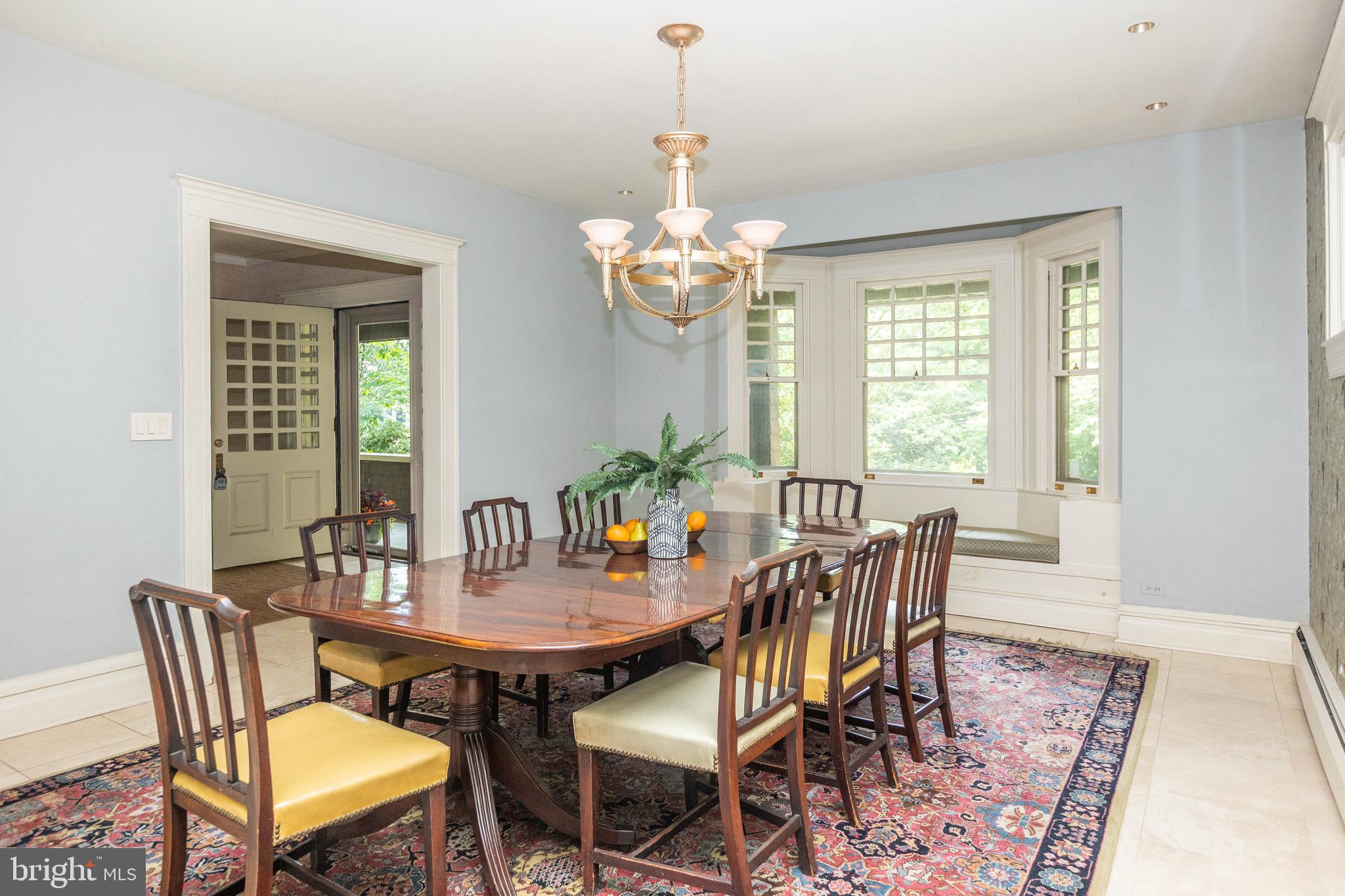 403 Club Road Baltimore, MD 21210 - Photo 11 of 72 a view of a dining room with furniture window and wooden floor
