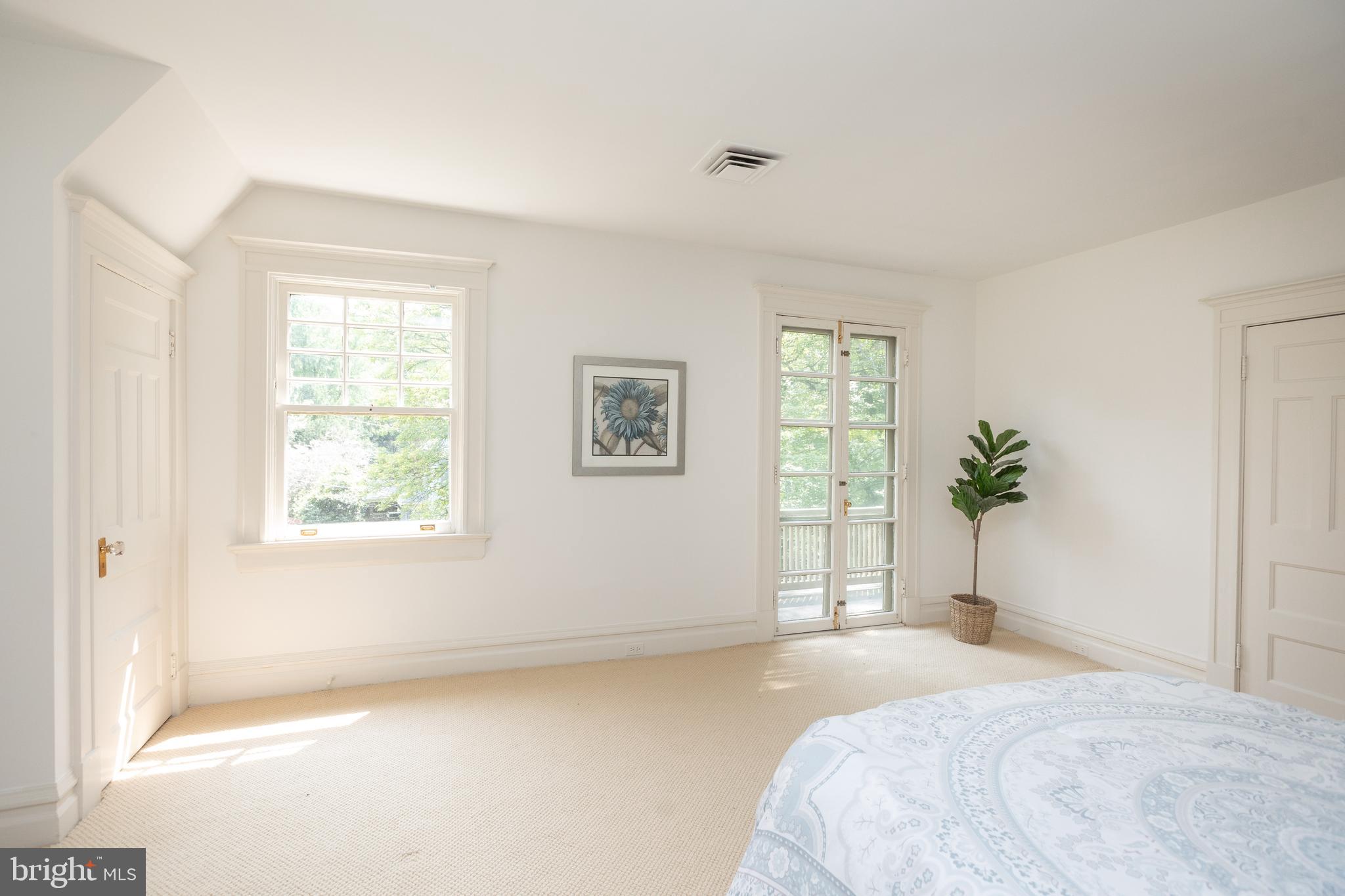 403 Club Road Baltimore, MD 21210 - Photo 42 of 72 a bedroom with a bed and a window