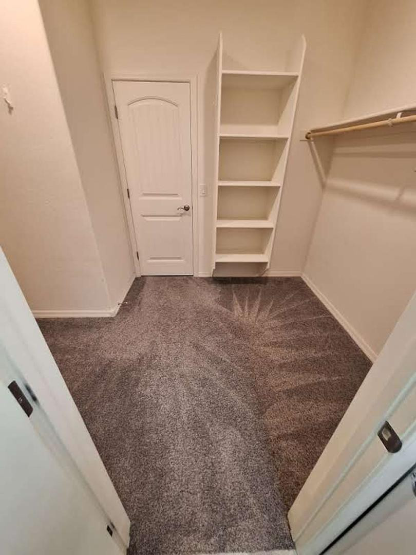 18541 West Mescal Street Surprise, AZ 85388 - Photo 22 of 31 a view of an empty walk in closet