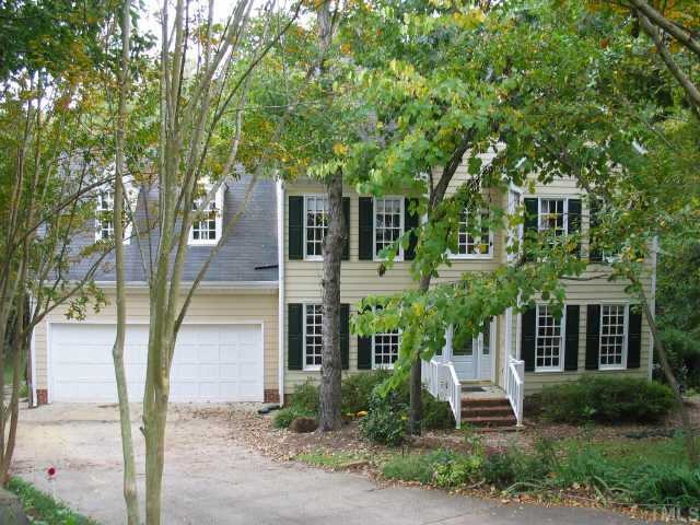 7701 Highlandview Circle Raleigh, NC 27613 - Photo 1 of 1 front view of a house with a yard