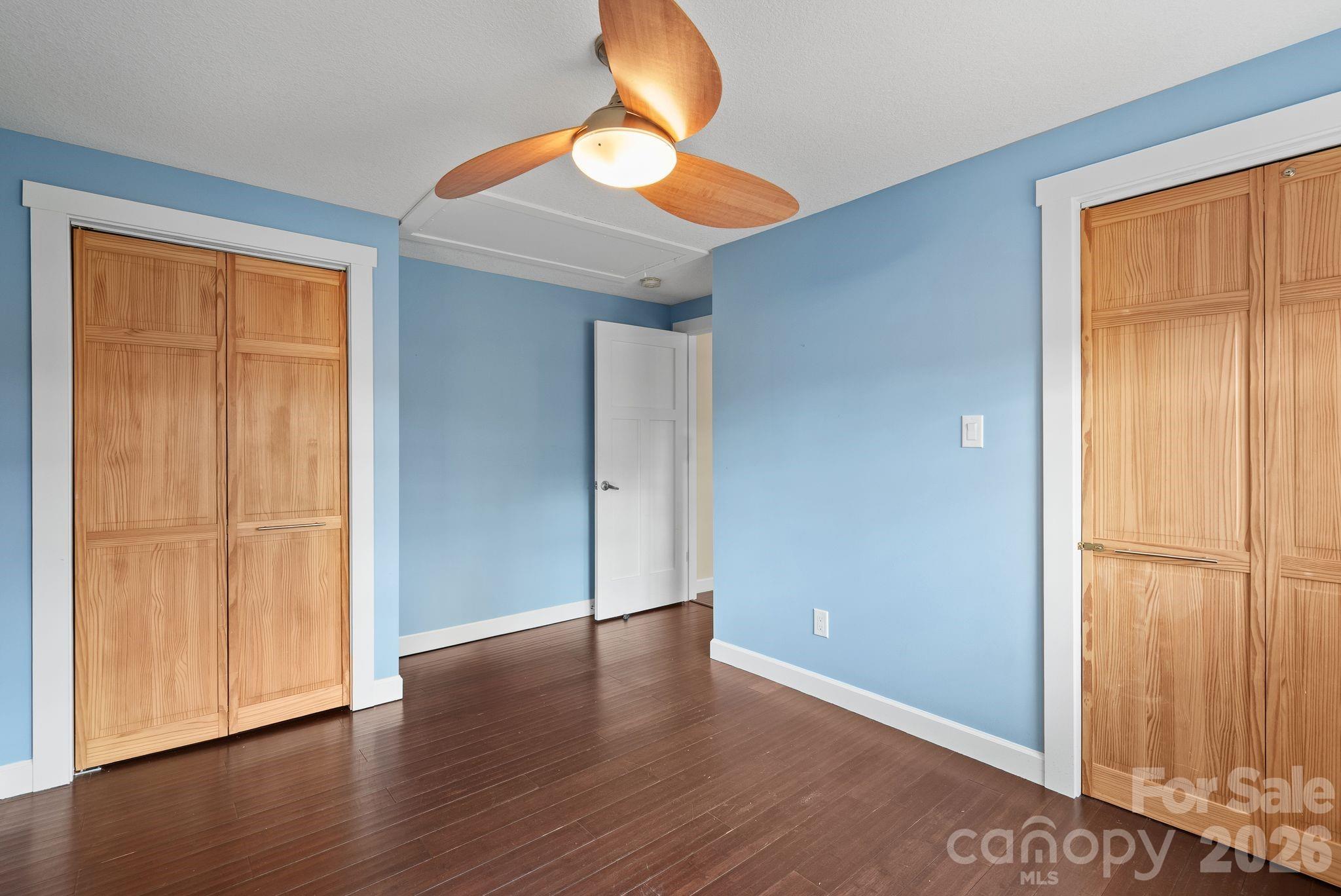 90 Palmer Ford Road Weaverville, NC 28787 - Photo 24 of 32 wooden floor in an empty room with a window