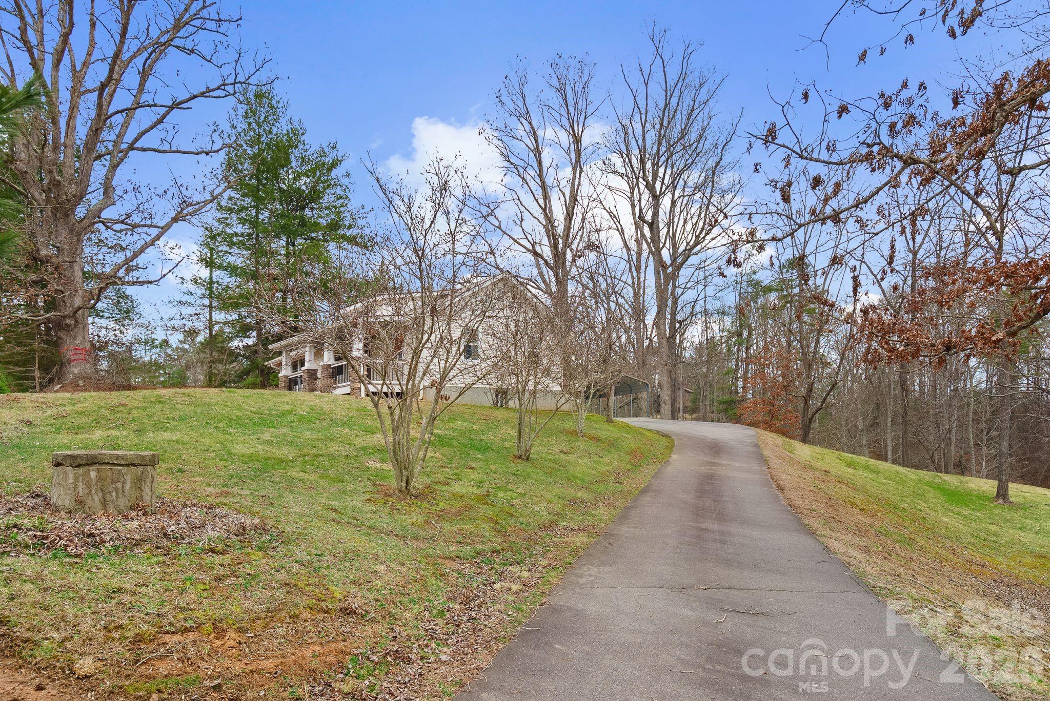 90 Palmer Ford Road Weaverville, NC 28787 - Photo 30 of 32 a view of a park with large trees