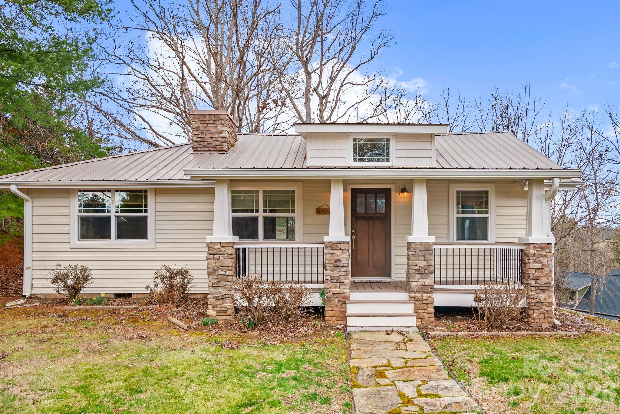 90 Palmer Ford Road Weaverville, NC 28787 - Photo 3 of 32 a front view of a house with a yard