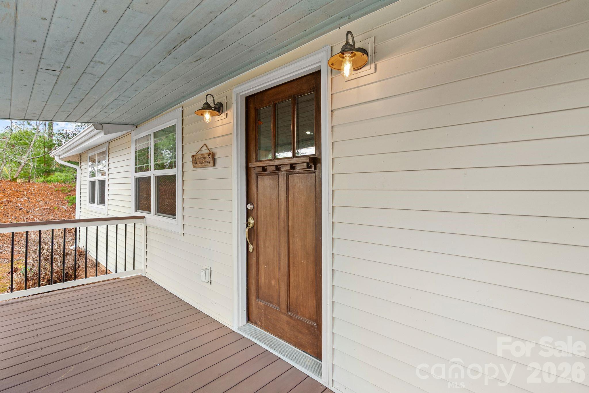 90 Palmer Ford Road Weaverville, NC 28787 - Photo 5 of 32 a view of a house with wooden deck