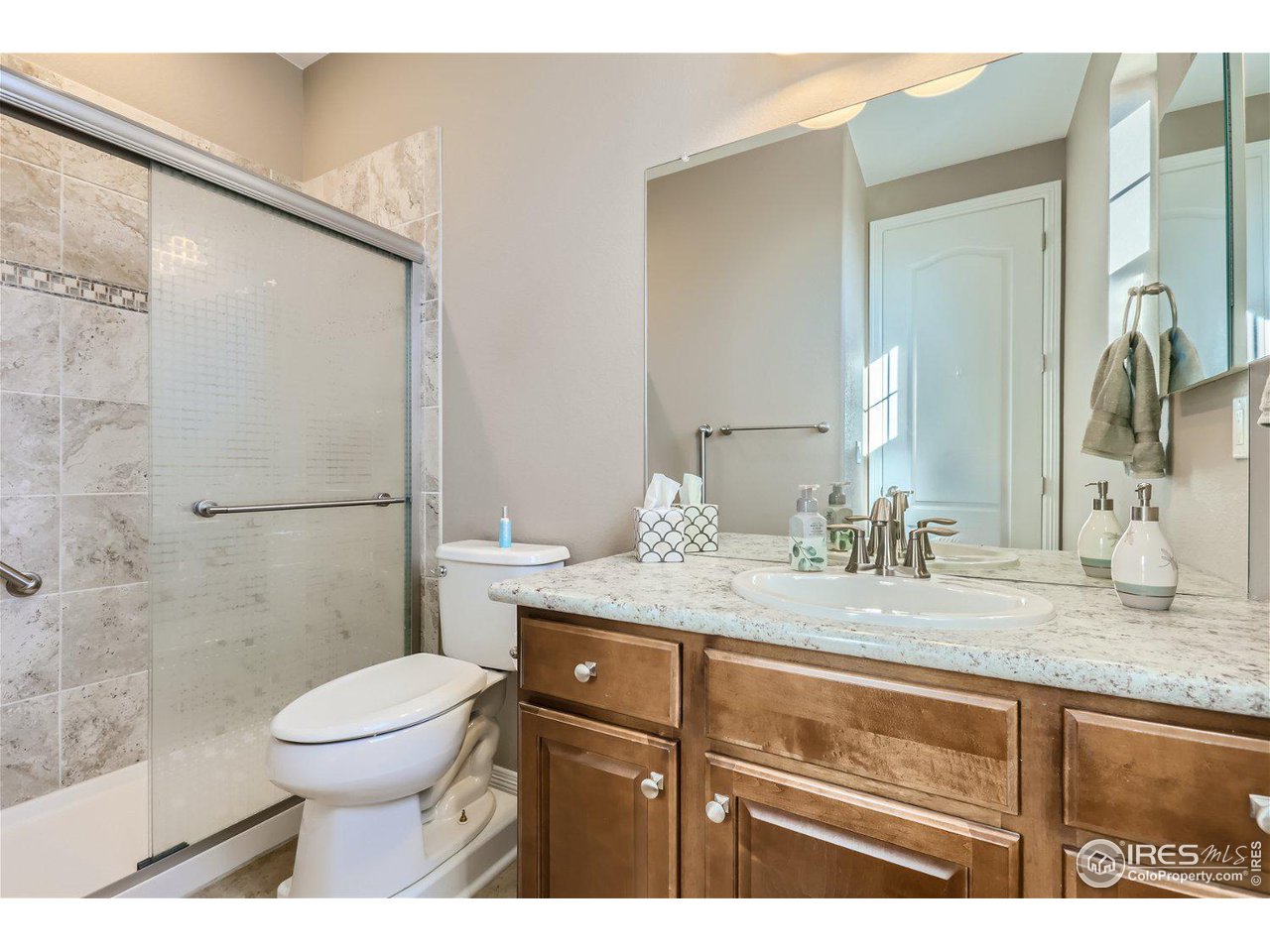 3381 Birch Road Longmont, CO 80504 - Photo 13 of 33 3/4 bath ensuite to mainfloor bedroom