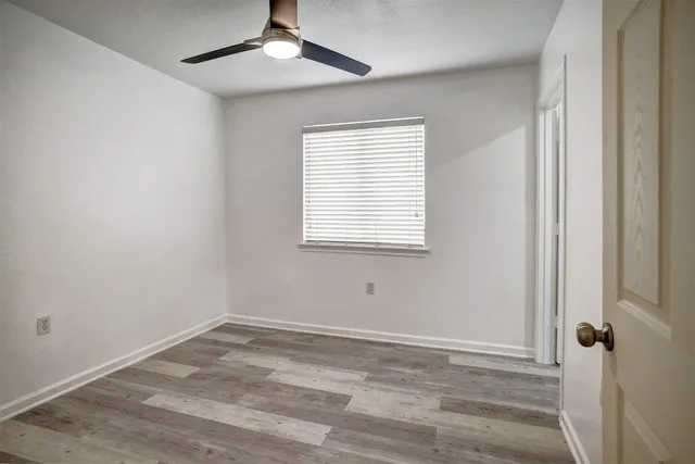 a view of a room that has a window in it