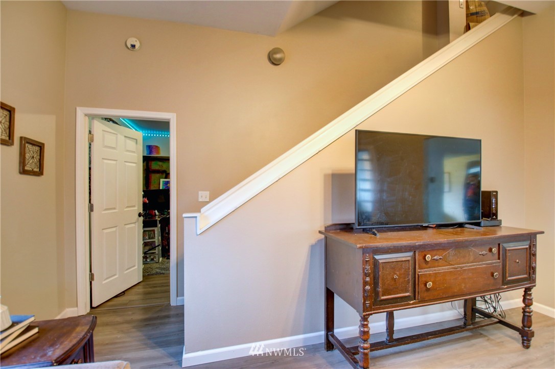 910 Cook Road Sedro-Woolley, WA 98284 - Photo 31 of 37 a view of room with wooden floor and windows