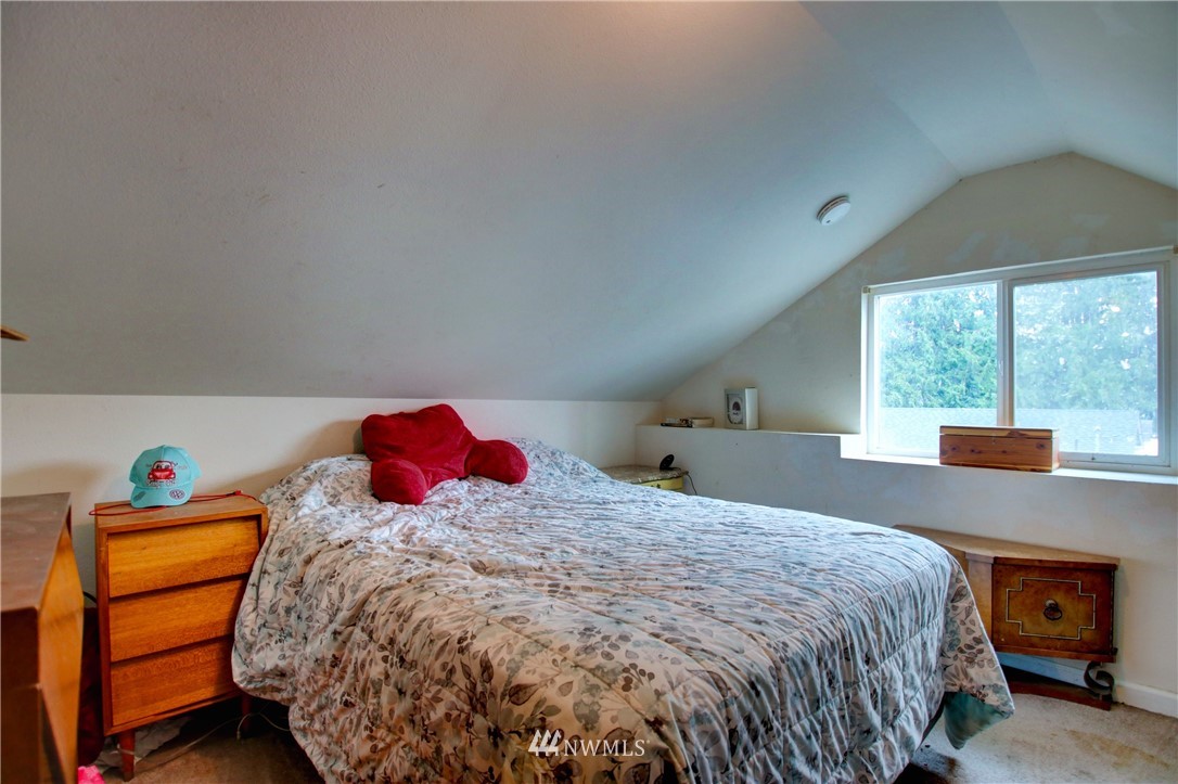910 Cook Road Sedro-Woolley, WA 98284 - Photo 33 of 37 a bedroom with a bed and window