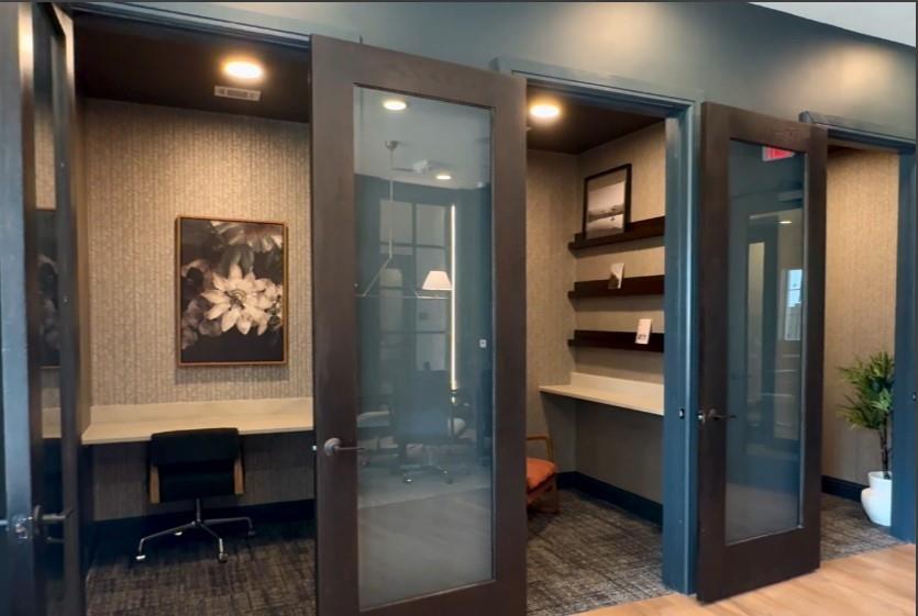 2300 Friendship Road, Unit 2305 Sherman, TX 75092 - Photo 5 of 12 a view of workspace with wooden floor and furniture