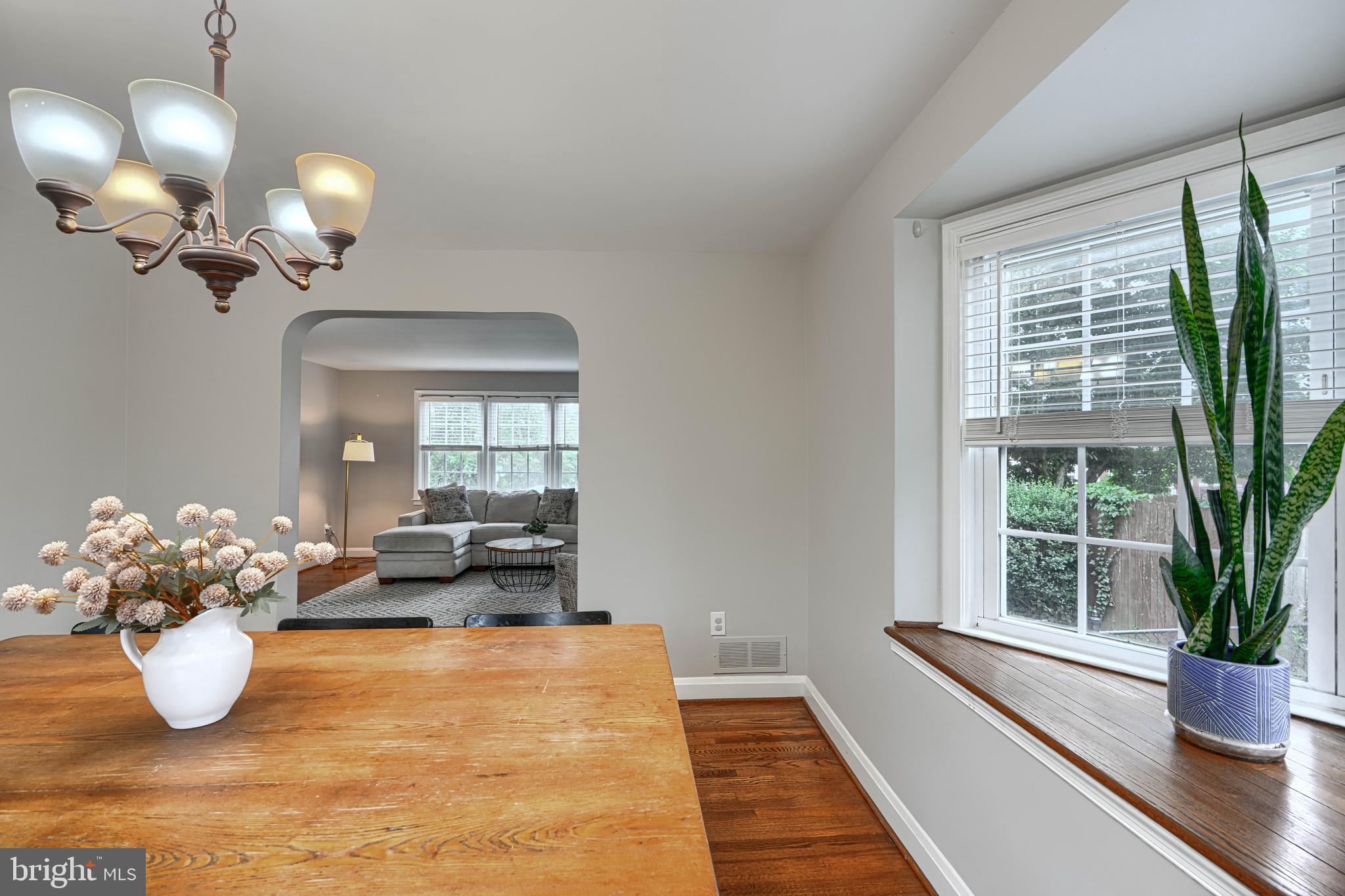 8132 Pleasant Plains Road Towson, MD 21286 - Photo 11 of 55 a dining room with chandelier