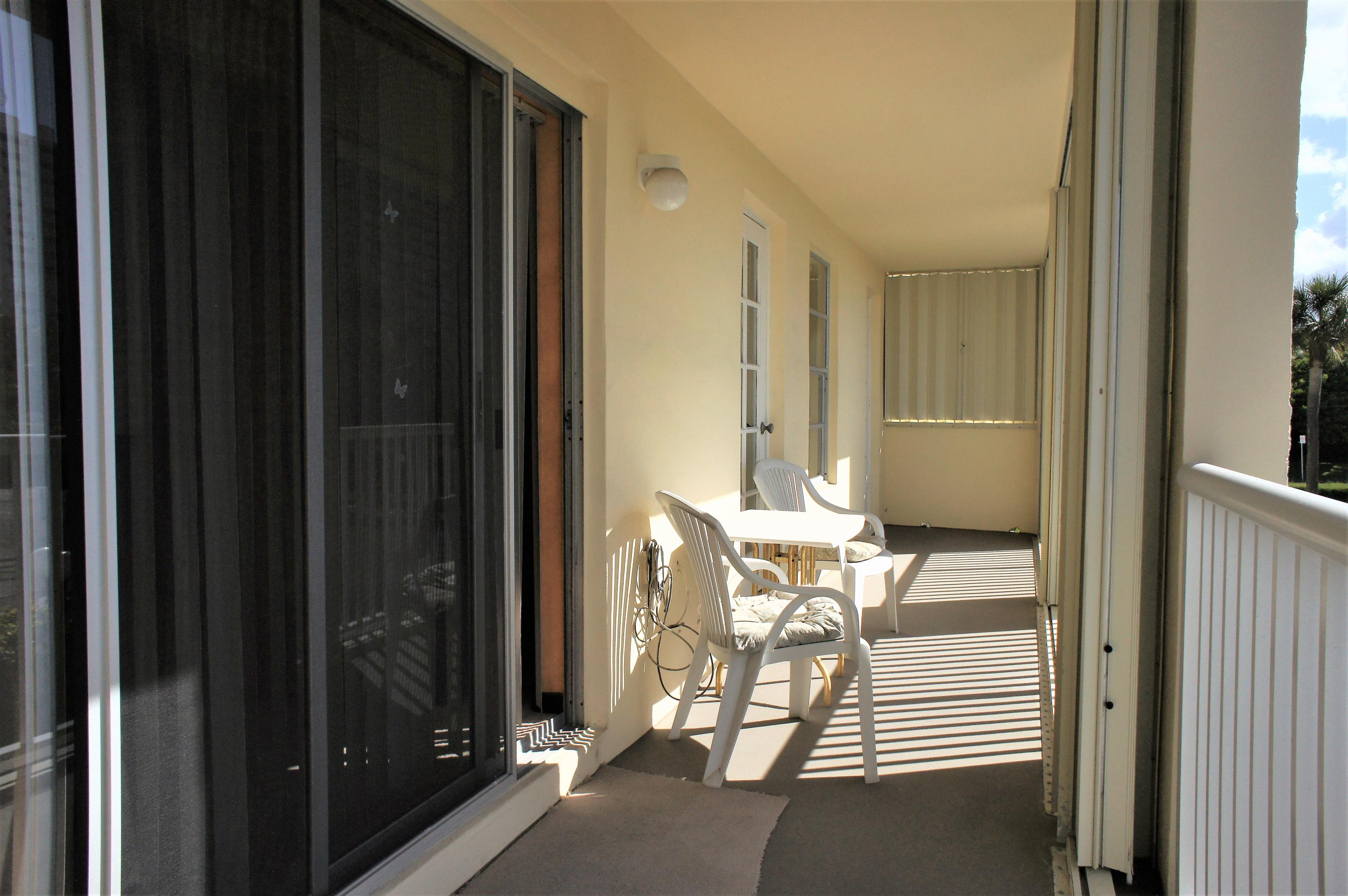 951 De Soto Road, Unit 234 Boca Raton, FL 33432 - Photo 19 of 44 a view of balcony with dining area