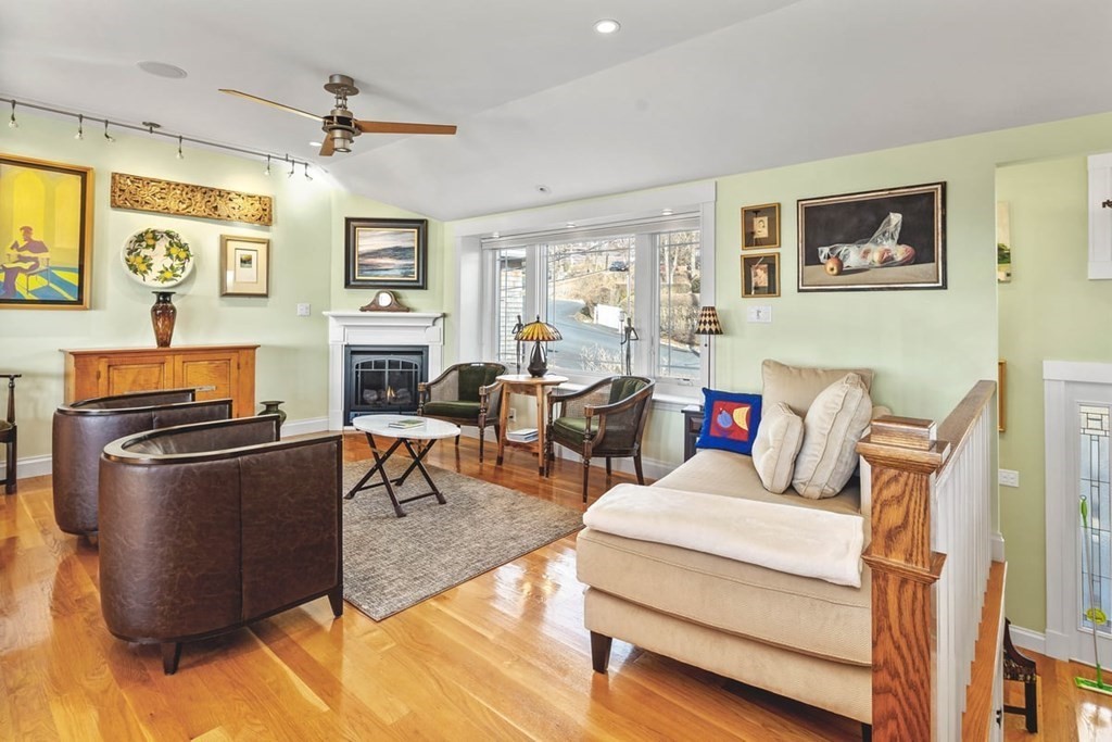 13 Beacon Road Hull, MA 02045 - Photo 11 of 41 a living room with furniture and a fireplace
