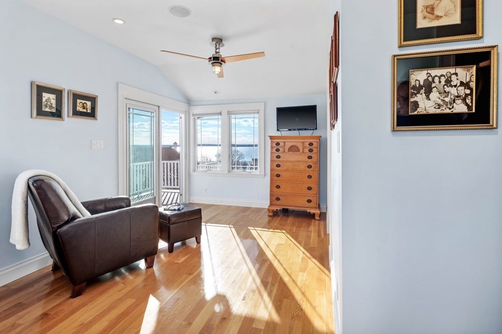 13 Beacon Road Hull, MA 02045 - Photo 14 of 41 a living room with furniture and a large window