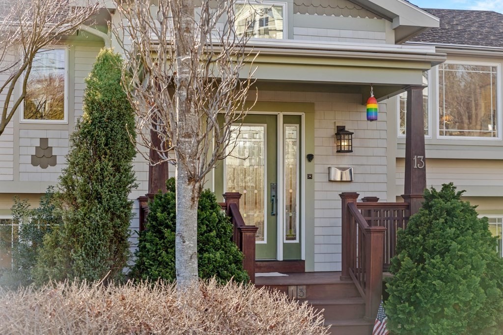 13 Beacon Road Hull, MA 02045 - Photo 2 of 41 a front view of a house with a garden