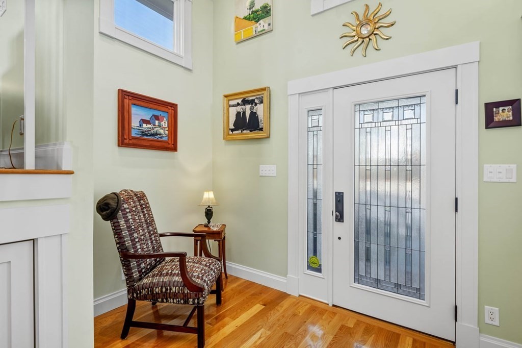 13 Beacon Road Hull, MA 02045 - Photo 3 of 41 a view of a livingroom with furniture and wooden floor