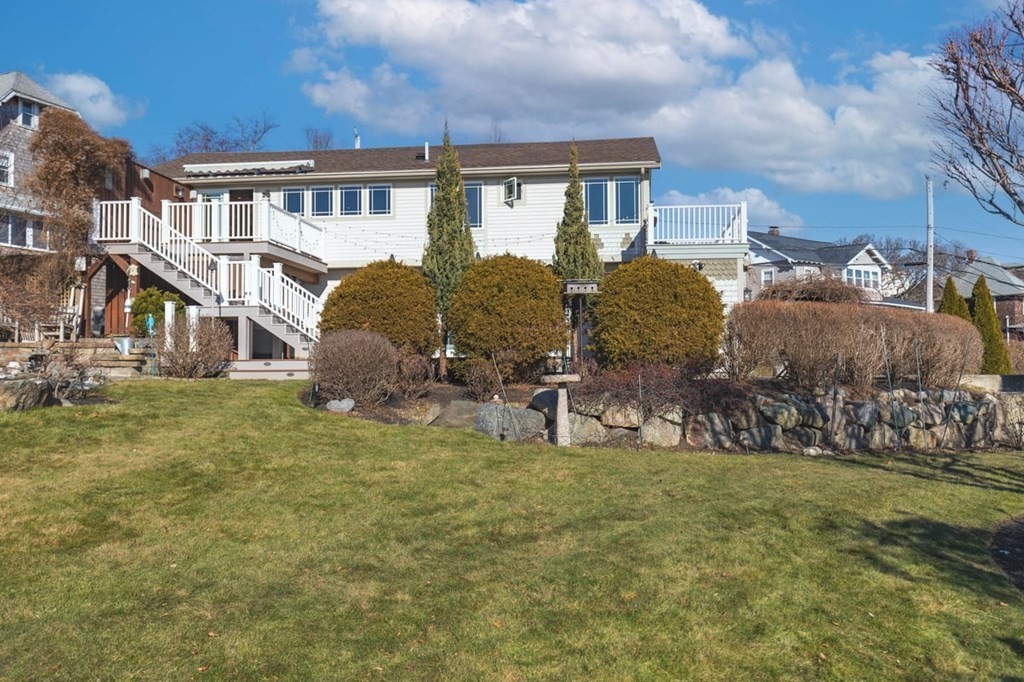 13 Beacon Road Hull, MA 02045 - Photo 33 of 41 a view of a house with a yard and sitting area