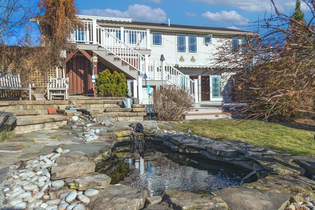 13 Beacon Road Hull, MA 02045 - Photo 34 of 41 a front view of a house with a yard