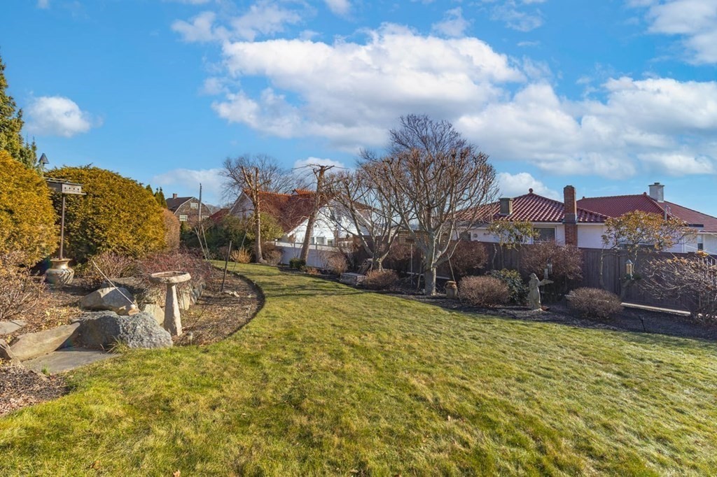 13 Beacon Road Hull, MA 02045 - Photo 36 of 41 a view of a houses with a yard