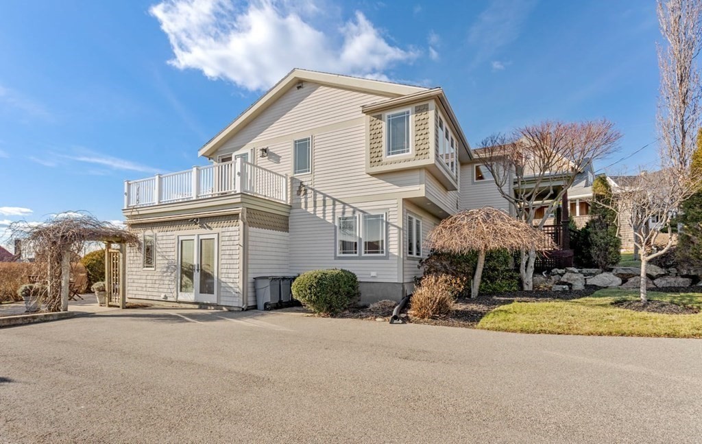 13 Beacon Road Hull, MA 02045 - Photo 39 of 41 a front view of a house with a yard