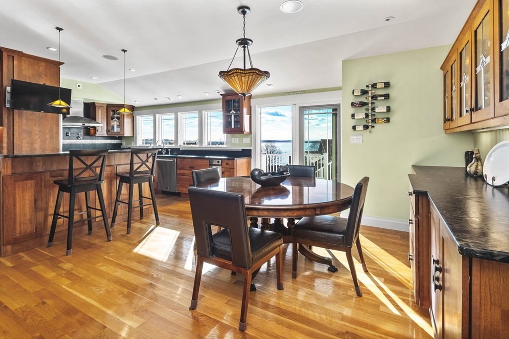 13 Beacon Road Hull, MA 02045 - Photo 4 of 41 a view of a dining room with furniture window and wooden floor