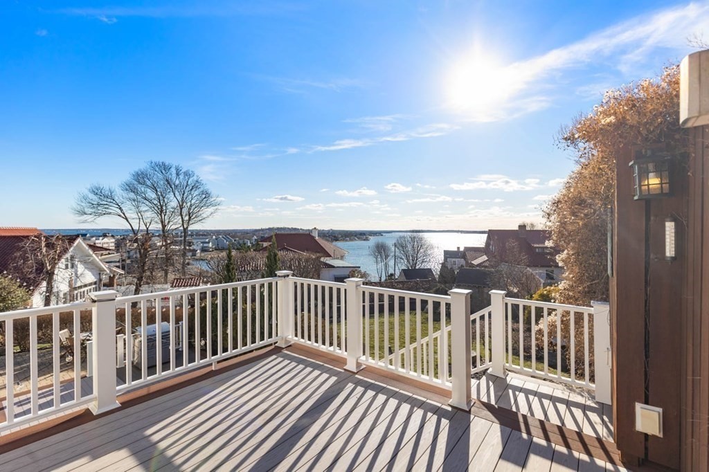 13 Beacon Road Hull, MA 02045 - Photo 5 of 41 a view of a balcony with wooden fence