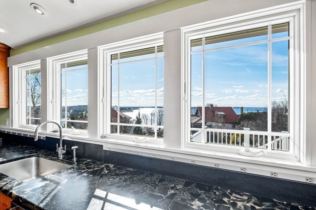 13 Beacon Road Hull, MA 02045 - Photo 6 of 41 a living room with a large window and a wooden floor