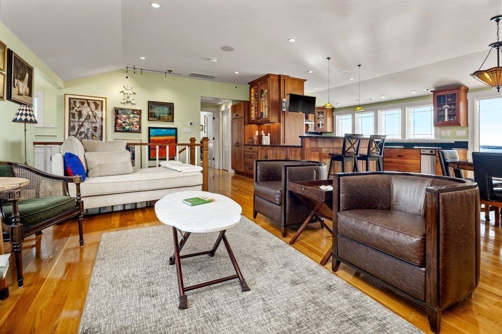13 Beacon Road Hull, MA 02045 - Photo 10 of 41 a living room with furniture and kitchen view